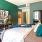 Bedroom with natural lighting and high ceilings